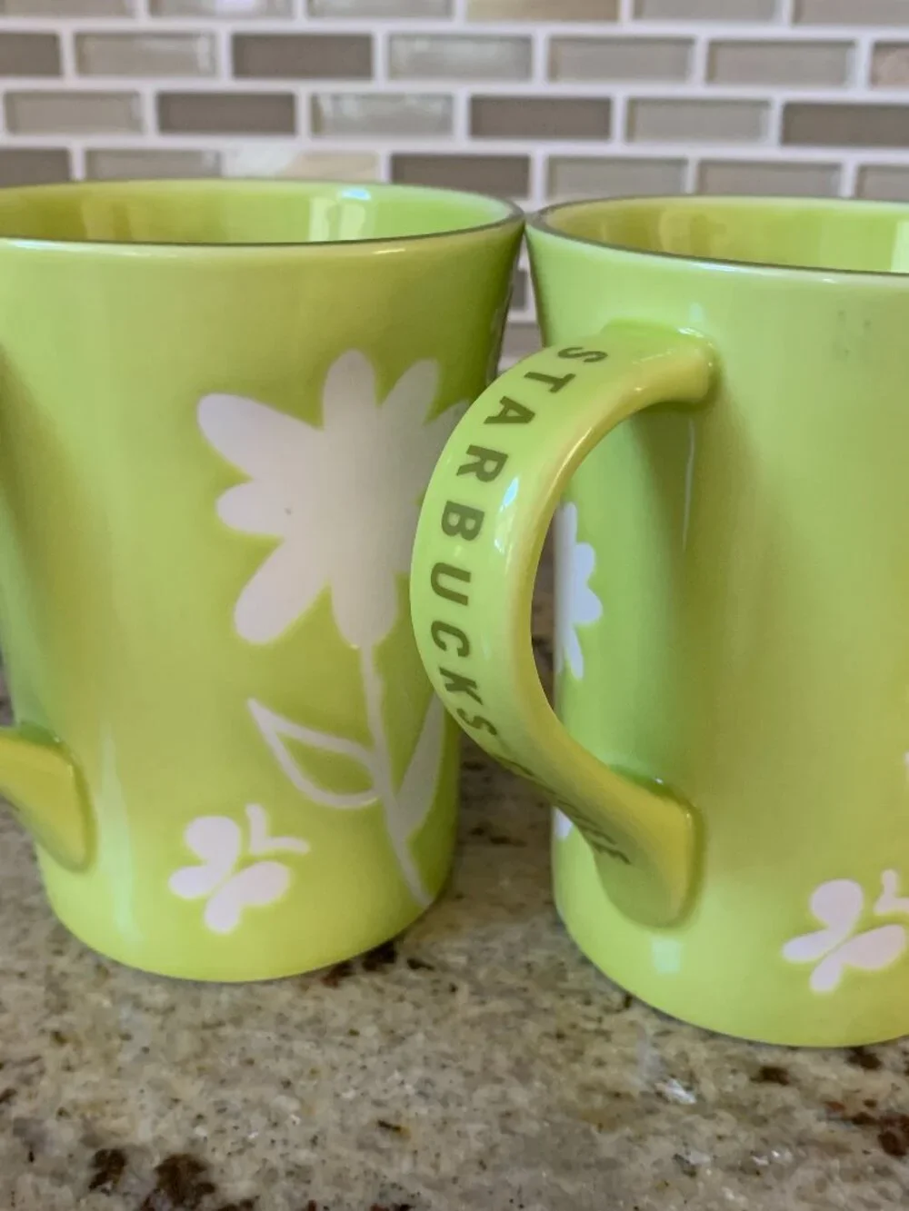 Starbucks 2007 lime green ceramic coffee mug white etched flowers lot of 2 12 oz